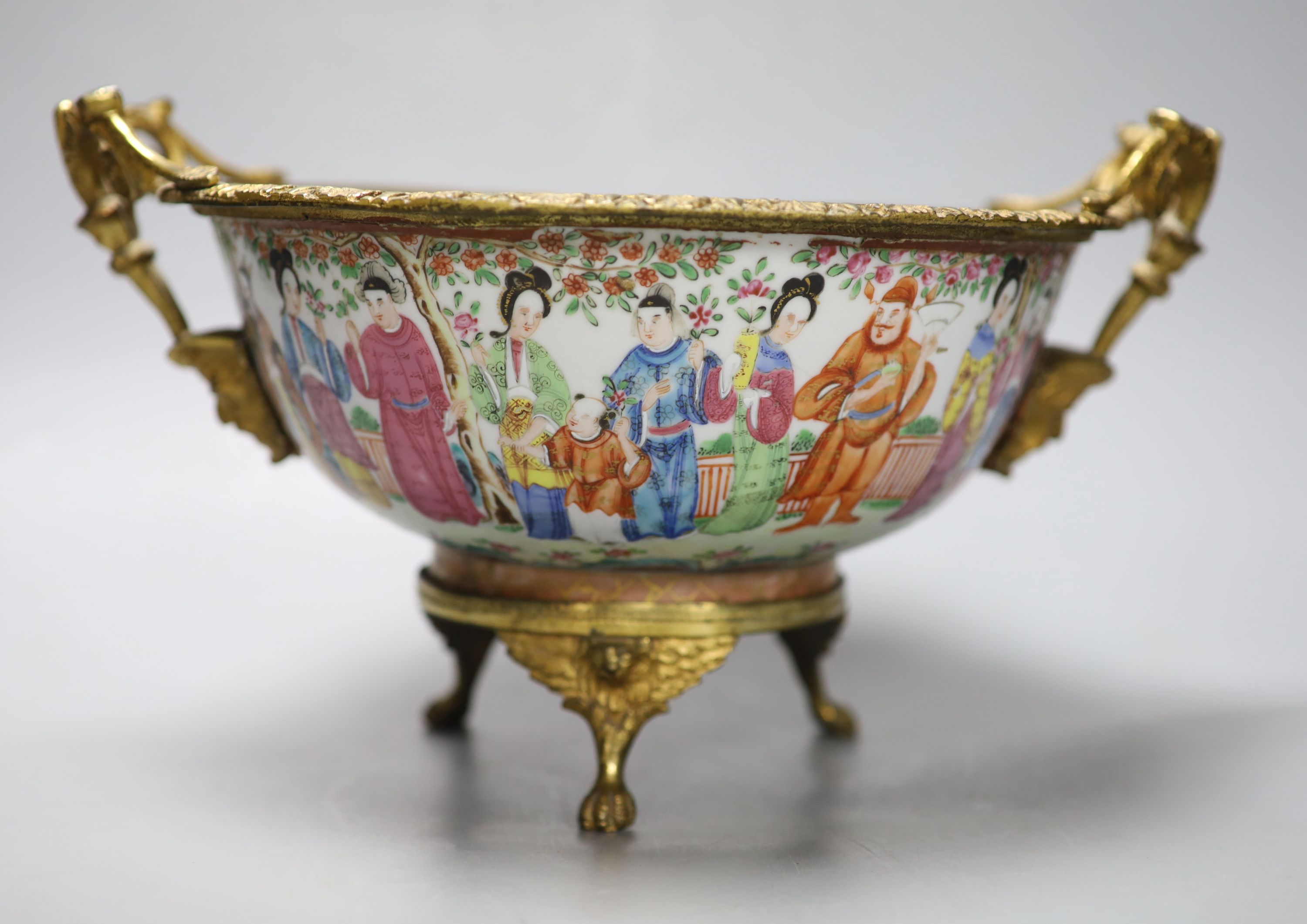 An early 19th century Chinese ormolu mounted famille rose bowl, 30cm handle to handle